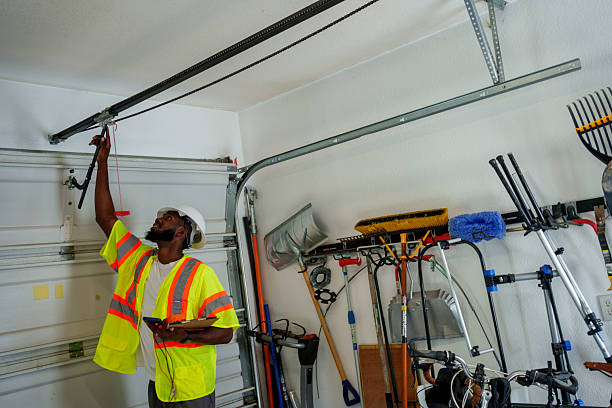 Professional Garage Door Roller Replacement technician working in Plains, KS